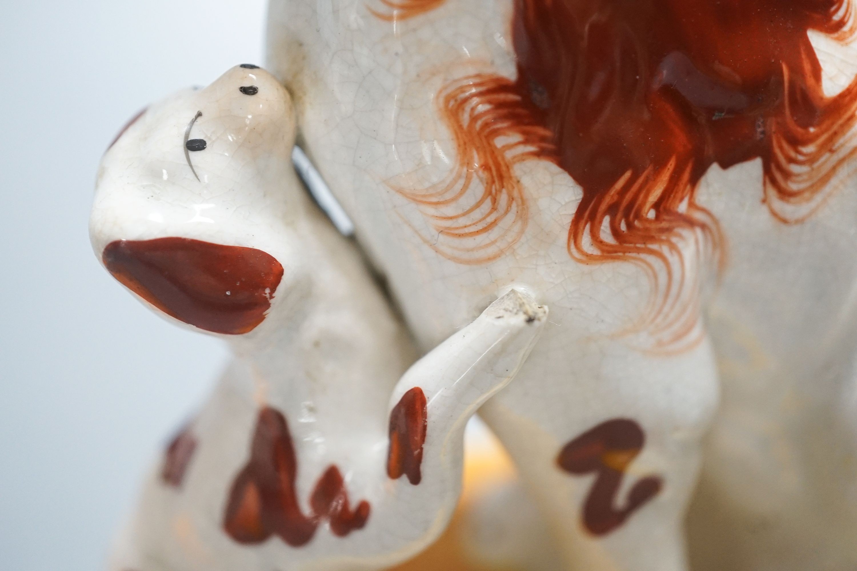 A pair of Staffordshire spaniel and puppy groups, 15cm high